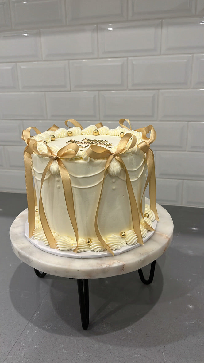 Bows & Buttercream Cake