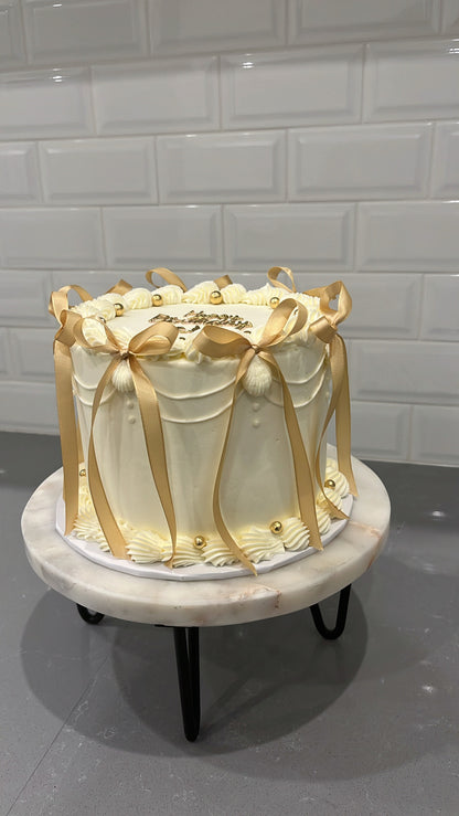 Bows & Buttercream Cake